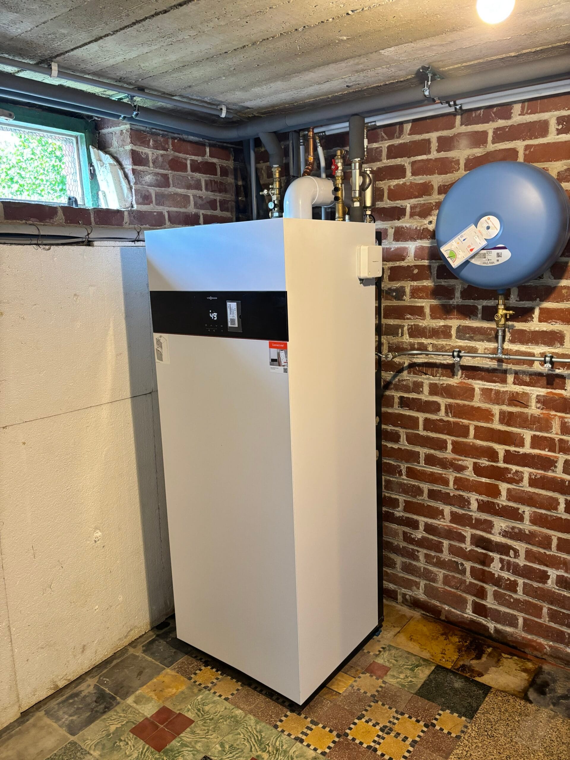 Chaudière gaz à condensation Viessmann Vitodens 111-F installée à Wanze par Confort Willem