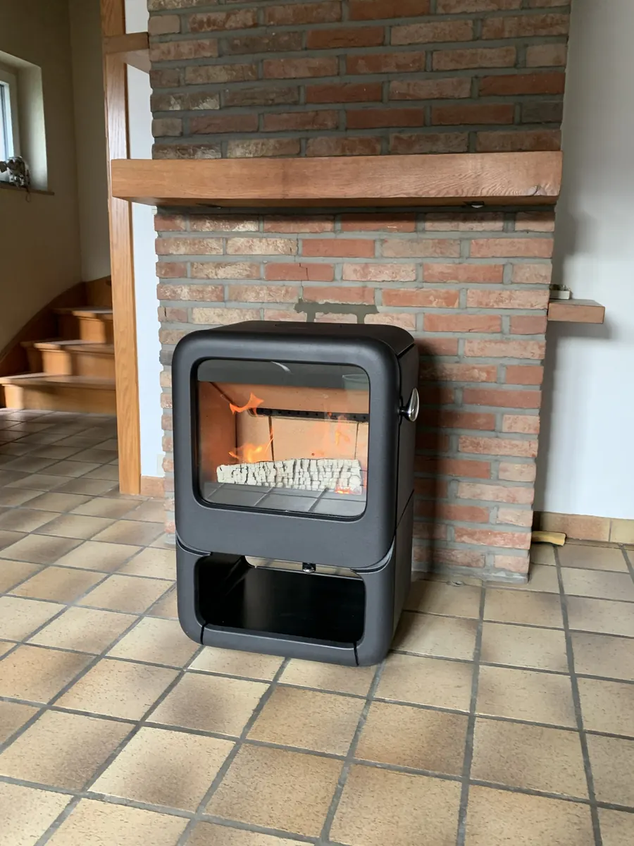 Séjour avec cheminée en briques et poêle à bois Dovre Rock 350, Seilles